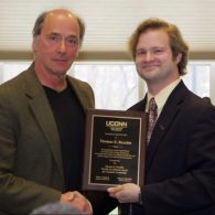University of Connecticut Early College Experience (UConn ECE) Concurrent Enrollment - a male winner receiving his award